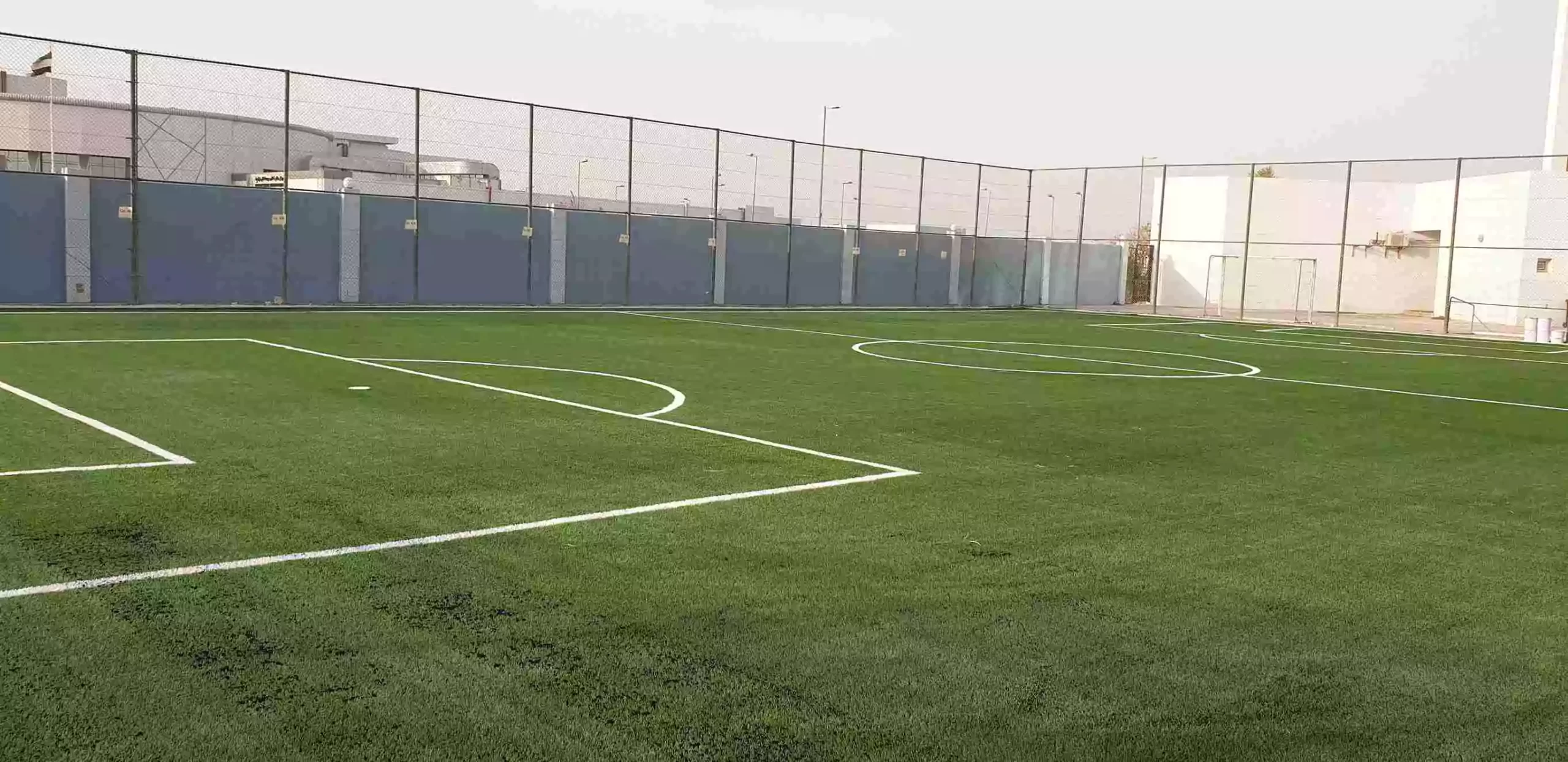Artificial turf solutions for multi-sport courts in UAE schools.
